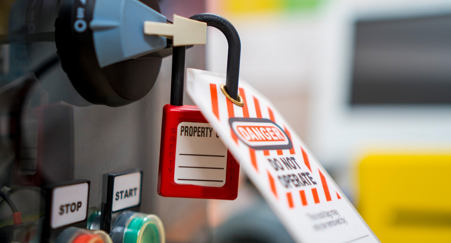 Image of a lock on a machine with a tag labled danger do not operate