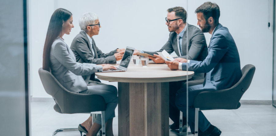 Business persons on meeting in the office.