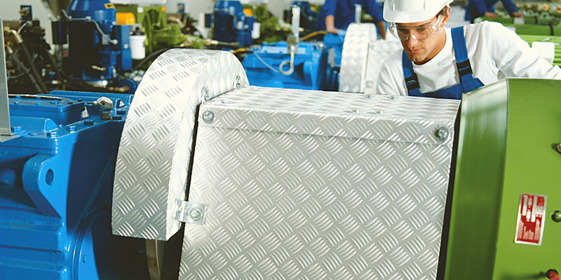 Technician working at a machine