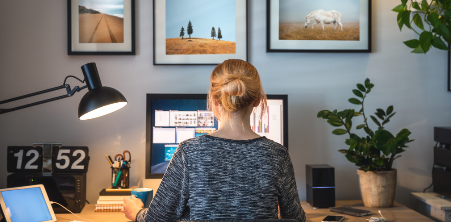 Image of a female sitting at home office desk
