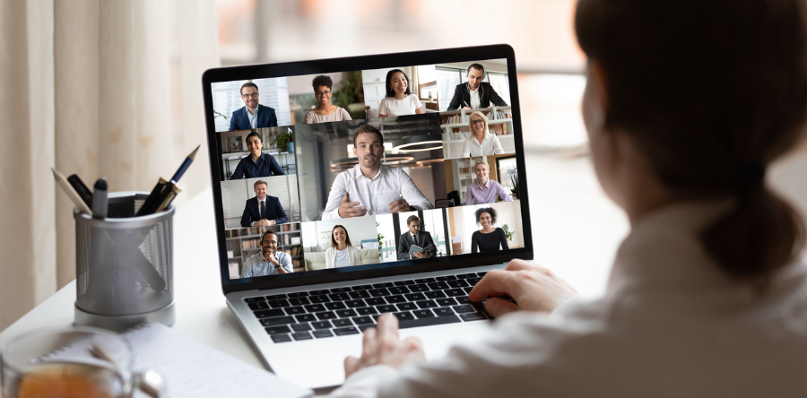 Image of workers participating in a virtual meeting