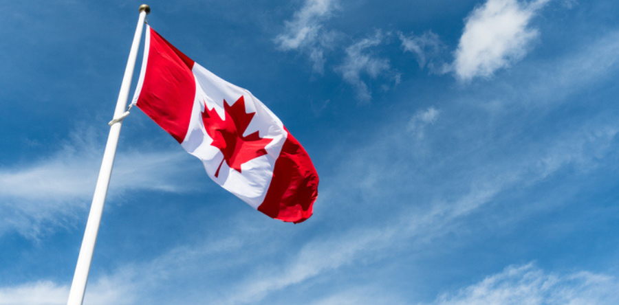 Image of a Canadian flag on a pole