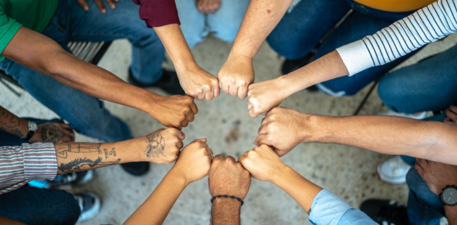 Image of a group fist bump