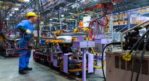 Modern automatic automobile manufacturing workshop. A busy car production line. Industrial scenery.