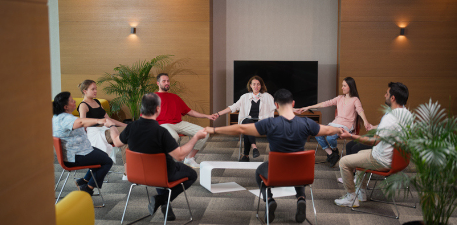 Image of a group of people sitting in a circle